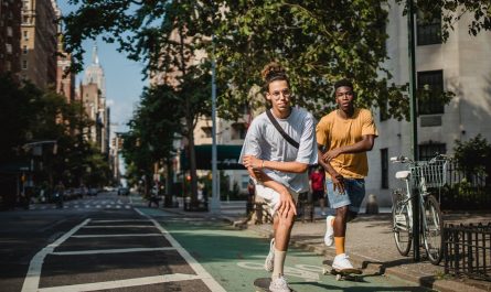 Photo by Budgeron Bach: https://www.pexels.com/photo/sporty-young-diverse-men-riding-skateboards-on-road-on-sunny-day-5157242/
