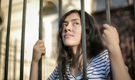 Photo by Andrea Piacquadio: https://www.pexels.com/photo/sad-isolated-young-woman-looking-away-through-fence-with-hope-3808803/